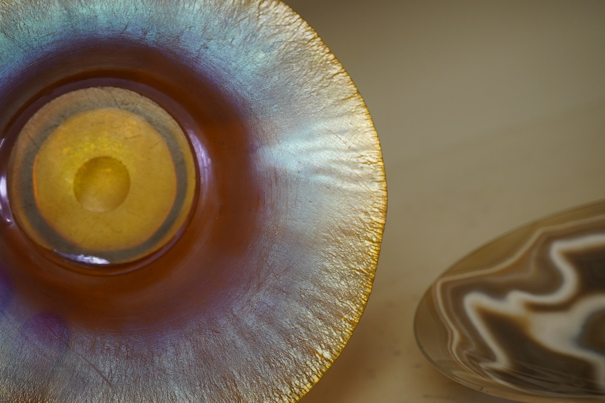 Two iridescent WMF art glass bowls and a polished agate bowl (3). Widest WMF bowl 16.5cm diameter. Condition - good